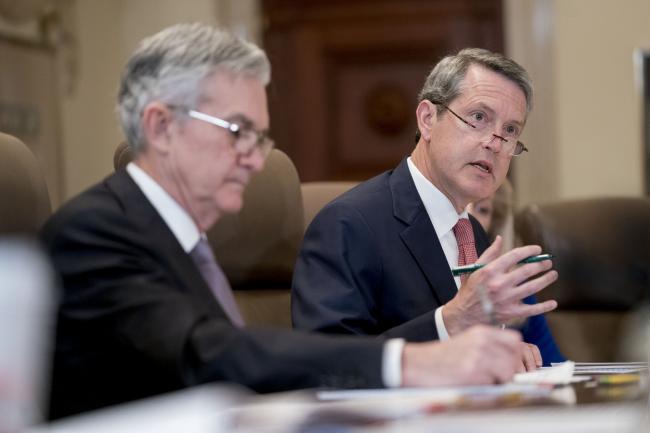 © Bloomberg. Randal Quarles, vice chairman of supervision at the Federal Reserve, right, speaks as Jerome Powell, chairman of the Federal Reserve, listens during a Federal Reserve Board meeting in Washington, D.C., U.S., on Monday, April 8, 2019. The Federal Reserve Board today is considering new rules governing the oversight of foreign banks. Powell said the Fed wants foreign lenders treated similarly to U.S. banks. Photographer: Andrew Harrer/Bloomberg