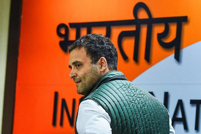 © Bloomberg. Indian National Congress Party president Rahul Gandhi leaves following a press conference at the All India Congress Committee offices in New Delhi on December 14, 2018.  Photographer: Chandan Khanna/AFP/Getty Images