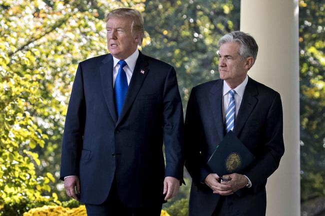© Bloomberg. Donald Trump and Jerome Powell. Photographer: Andrew Harrer/Bloomberg