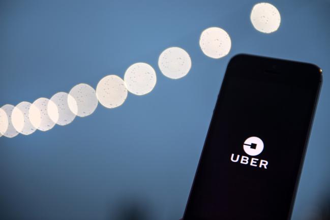 © Bloomberg. An Uber Technologies Inc. logo sits on a smartphone display in this arranged photograph in London, U.K.