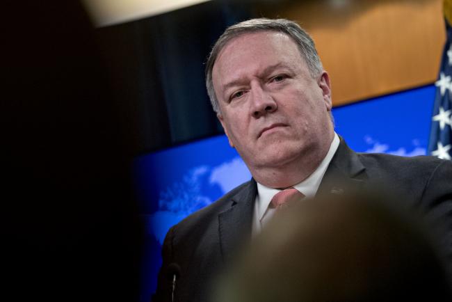 © Bloomberg. Mike Pompeo, U.S. secretary of state, listens during a news conference at the State Department in Washington, D.C., U.S., on Tuesday, Oct. 23, 2018. Pompeo said the U.S. is moving against individuals it suspects were involved in the killing of journalist Jamal Khashoggi at a Saudi consulate in Istanbul without identifying their names or nationalities. 