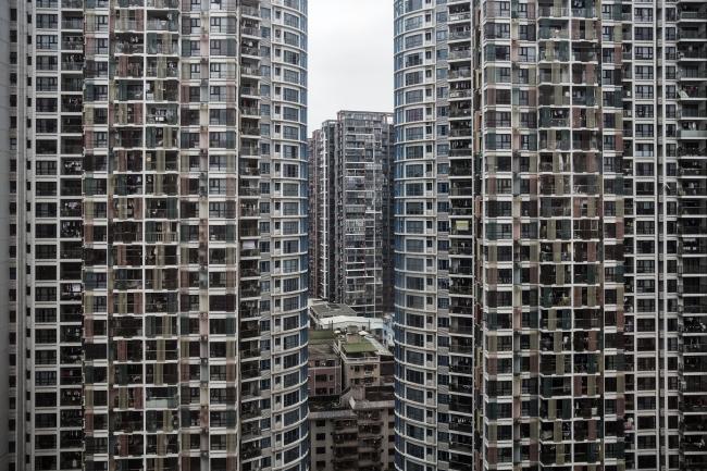 © Bloomberg. Residential buildings stand in Shenzhen, Guangdong province, China, on Wednesday, April 20, 2016.  Photographer: Qilai Shen/Bloomberg