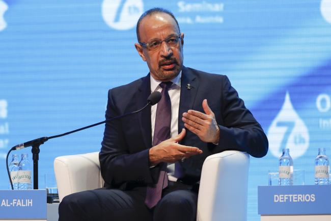 © Bloomberg. Khalid al-Falih, Saudi Arabia's energy minister, gestures as he speaks during day two of the 7th Organization Of Petroleum Exporting Countries (OPEC) international seminar in Vienna, Austria, on Thursday, June 21, 2018. The odds of OPEC reaching an oil-production deal increased as Iran edged away from a threat to veto any agreement that would raise output and Saudi Arabia put forward a plan that would add about 600,000 barrels a day to the global market. Photographer: Stefan Wermuth/Bloomberg