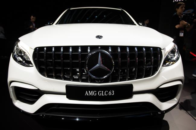 © Bloomberg. The Mercedes-Benz AMG GLC 63 crossover vehicle is displayed during the 2017 New York International Auto Show (NYIAS) in New York, U.S., on Wednesday, April 12, 2017. The New York International Auto Show, North America's first and largest-attended auto show dating back to 1900, showcases an incredible collection of cutting-edge design and extraordinary innovation. Photographer: Mark Kauzlarich/Bloomberg