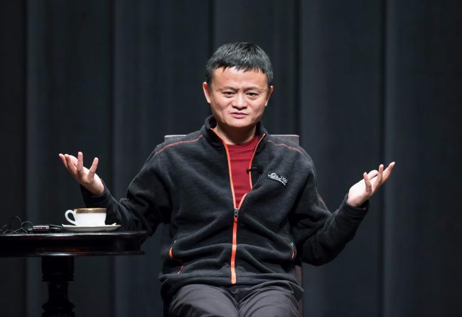 © Bloomberg. Jack Ma, billionaire and chairman of Alibaba Group Holding Ltd., gestures as he speaks during an event at Waseda University in Tokyo, Japan, on Wednesday, April 25, 2018. Ma, Alibaba co-founder, argues that nations from Japan to China need to develop their own semiconductor technology to get around America’s grip on the global chip market. Photographer: Tomohiro Ohsumi/Bloomberg