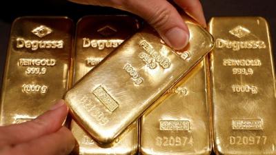Giá vàng tăng, USD giảm sau tuyên bố “mềm mỏng” của Chủ tịch FED