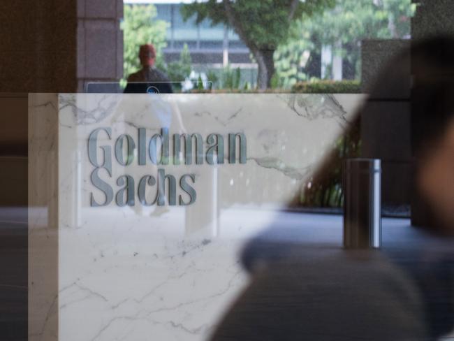 © Bloomberg. The Goldman Sachs Group Inc. logo is displayed in the reception area of the One Raffles Link building, which houses one of the Goldman Sachs (Singapore) Pte offices, in Singapore. 
