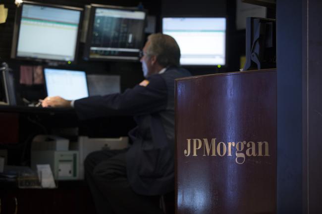 © Bloomberg. The JPMorgan logo is displayed on the floor of the New York Stock Exchange (NYSE) in New York, U.S., on Monday, July 29, 2013.  Photographer: Scott Eells/Bloomberg