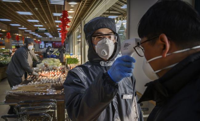 China’s Top Leaders Vow to Meet Economic Targets Despite Virus