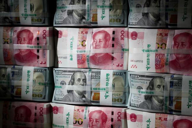 China Sets Yuan Fixing Stronger Than Expected, Soothing Nerves