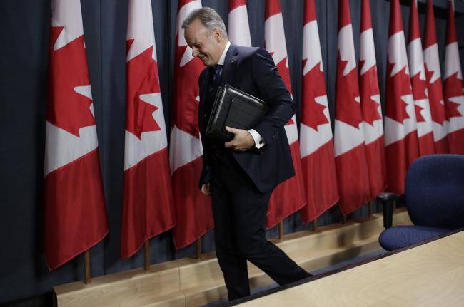 © Bloomberg. Stephen Poloz, governor of the Bank of Canada, exits after a news conference at the National Press Theatre in Ottawa, Ontario, Canada, on Wednesday, Oct. 19, 2016. Poloz said Bank of Canada policy makers 