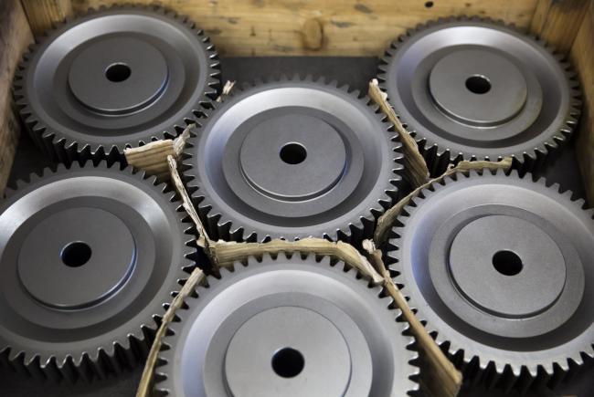 © Bloomberg. Gears bound for shipment sit in a tray on the production line of the Kohara Gear Industry Co. factory in Kawaguchi, Japan, on Tuesday, Feb. 12, 2019. Japan is scheduled to release fourth-quarter gross domestic product (GDP) figures Feb. 14. Photographer: Tomohiro Ohsumi/Bloomberg