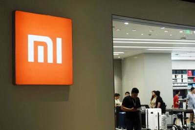 Cổ phiếu Xiaomi bỗng tăng vọt 14% sau phiên chào sàn đáng thất vọng