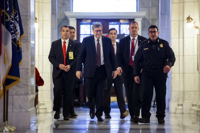 © Bloomberg. William Barr, attorney general nominee for U.S. President Donald Trump, center, arrives to meet with Senator Lindsey Graham, a Republican from South Carolina, not pictured, at the U.S. Capitol in Washington, D.C., U.S., on Wednesday, Jan. 9, 2019. Deputy Attorney General Rod Rosenstein is expected to leave after President Trump's pick for attorney general, William Barr, is confirmed, according to a person familiar with the matter. 
