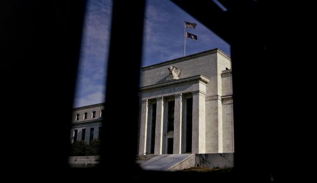 Fed Officials Saw Policy Appropriate ‘For a Time’ Amid Risks