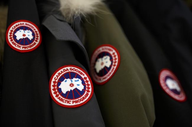 &copy Bloomberg. Logo patches are seen on winter jackets inside the Canada Goose Holdings Inc. production facility in Toronto. 