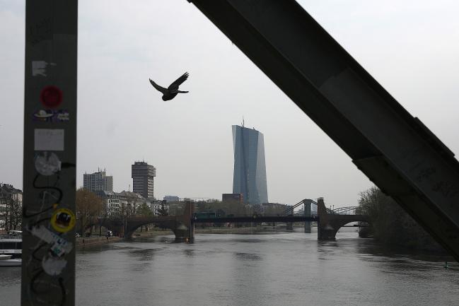 © Bloomberg. The European Central Bank (ECB) headquarters stand beside the River Main in Frankfurt, Germany, on Wednesday, April 10, 2019. The ECB's policy update is only one of several important gatherings this week in the realm of global economics. Photographer: Krisztian Bocsi/Bloomberg