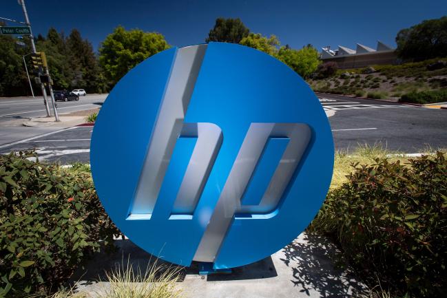© Bloomberg. HP Inc. signage stands on display outside the company's headquarters in Palo Alto, California, U.S., on Monday, May 28, 2018. HP Inc. is releasing earnings figures on May 29. 