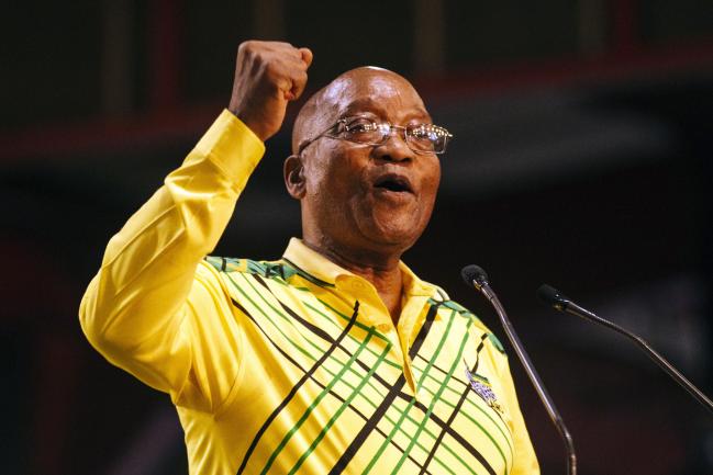 © Bloomberg. Jacob Zuma, South Africa's president, gestures as he speaks at the 54th national conference of the African National Congress party (ANC) in Johannesburg, South Africa, on Saturday, Dec. 16, 2017. Zuma urged the ruling African National Congress to fight factionalism and consider accommodating members of rival slates in its new leadership that will be elected at its national conference.