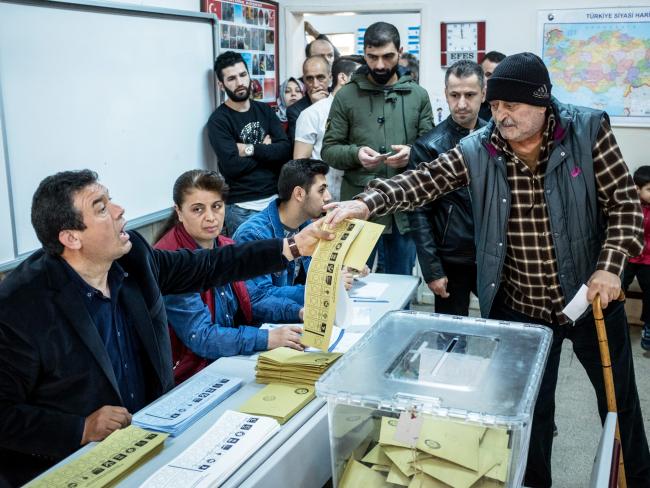 &copy Bloomberg. ISTANBUL, TURKEY - MARCH 31: A man arrives to cast his vote in local municipal elections at a school on March 31, 2019 in Istanbul, Turkey. Approximately 57 million people will vote for mayors and local representatives across the country. The results are expected to be used as a gauge of the popularity of President Erdogan's AK Parti amid the countries economic instability. (Photo by Chris McGrath/Getty Images)