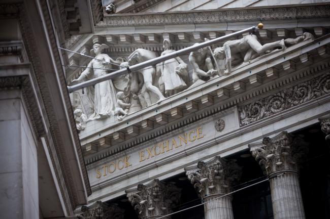 © Bloomberg. The New York Stock Exchange (NYSE) stands in New York, U.S., on Monday, Feb. 12, 2018. U.S. stocks advanced as Treasury yields erased their climb, with financial markets looking to stabilize after the worst week in two years for American equities.