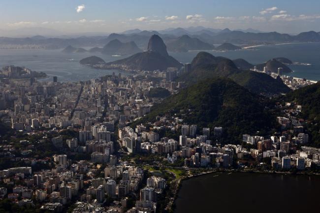 © Bloomberg. Guanabara Bay is seen in this aerial photograph of Rio de Janeiro, Brazil. Photographer: Dado Galdieri