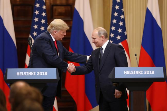 © Bloomberg. Donald Trump and Vladimir Putin in Helsinki on July 16. Photographer: Chris Ratcliffe/Bloomberg