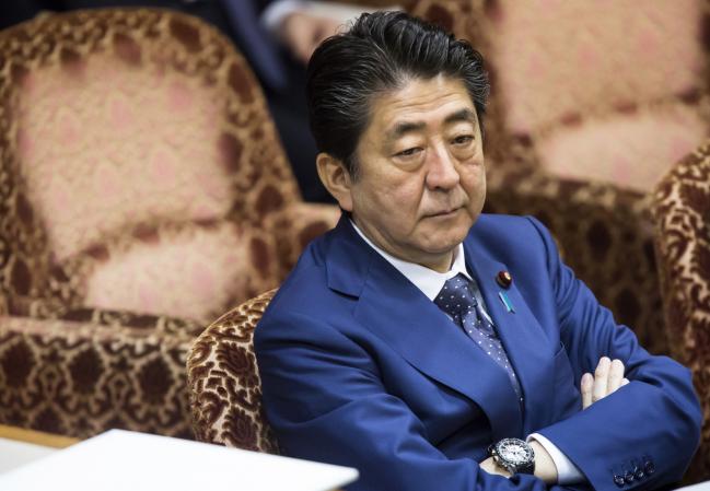 © Bloomberg. Shinzo Abe, Japan's prime minister, attends a budget committee session at the upper house of parliament in Tokyo, Japan, on Wednesday, March 14, 2018.