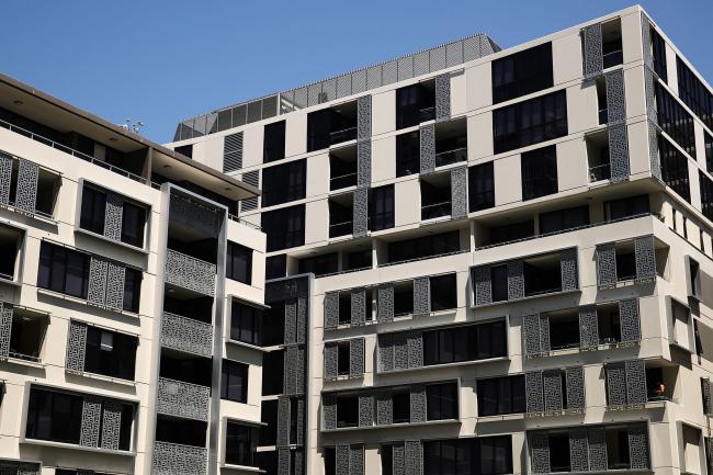 © Bloomberg. A residential building stands in the Zetland area of Sydney, Australia, on Saturday, Jan. 12, 2019. Prices in Australia's biggest city have tumbled 10 percent and some economists are tipping a similar fall this year. While the central bank isn't panicking just yet, a 15 percent nationwide drop in prices would cut about A$1 trillion ($720 billion) from the housing stock value. Photographer: Brendon Thorne/Bloomberg