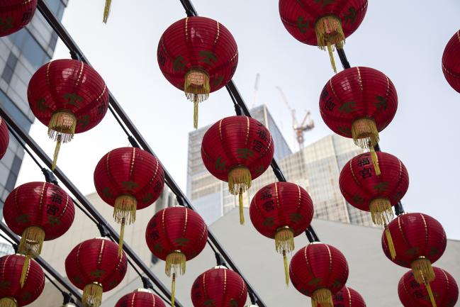 © Bloomberg. Lanterns hang outside a Chinese temple ahead of the Lunar New Year in Singapore, on Saturday, Feb. 10, 2018. Singapore, scheduled to release forth-quarter gross domestic figures (GDP) on Feb. 14, may unveil an e-commerce tax in next week's budget, setting the tone for a region that's grappling with online retail's assault on brick-and-mortar vendors.
