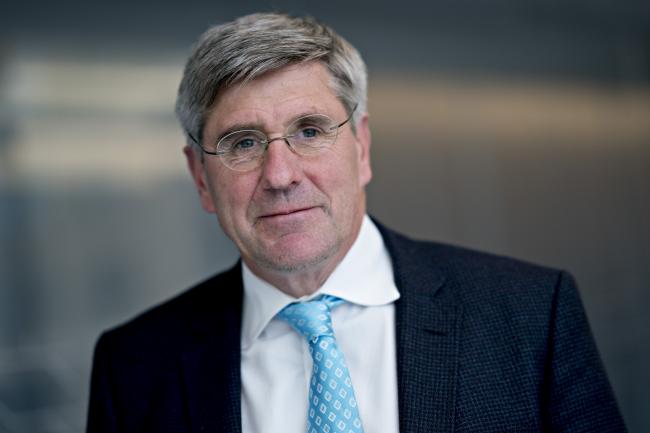 © Bloomberg. Stephen Moore, visiting fellow at the Heritage Foundation, stands for a photograph following a Bloomberg Television interview in Washington, D.C., U.S., on Friday, March 22, 2019. President Donald Trump said he's nominating Moore, a long-time supporter of the president, for a seat on the Federal Reserve Board. Photographer: Andrew Harrer/Bloomberg