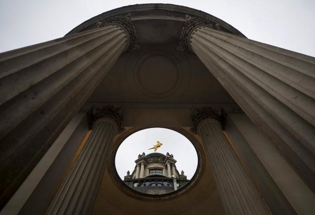 &copy Bloomberg. A statue of 'Ariel', seen from the skylight of a public walkway, stands on top of the Bank of England (BOE) in London, U.K., on Monday, Feb. 4, 2019. Bank of England officials are stuck in a Brexit rut, as the U.K.'s increasingly chaotic political backdrop looks set to drown out any talk of higher interest rates. 