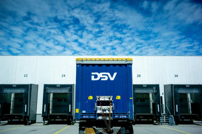 © Bloomberg. A DSV AS trailer sits at a loading bay at DSV facilities in Hedehusene, Denmark. 