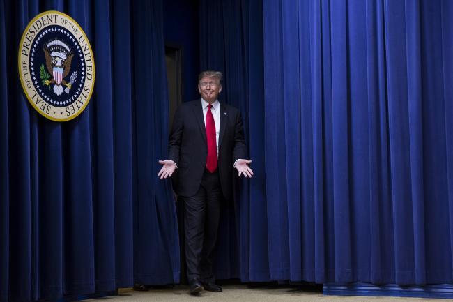 © Bloomberg. U.S. President Donald Trump arrives to a signing ceremony for H.R. 2, Agriculture Improvement Act of 2018, at the White House in Washington, D.C., U.S., on Thursday, Dec. 20, 2018. The Trump administration's aid package for U.S. farmers hurt by the trade war could end up saving some soybean acres next year. Photographer: Zach Gibson/Bloomberg