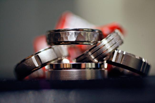 © Bloomberg. Palladium wedding bands are displayed for a photograph in a a Fortunoff store in New York, Monday, May 21, 2007.  Supplies of palladium are declining because Russia, the producer of about half of the global supply, will slash exports for the second straight year, according to Johnson Matthey Plc, the largest marketer of the metal. Palladium may jump 37 percent to $500 an ounce by yearend, says Gerry Schubert, a director ofmetals in London at Fortis, Belgium's biggest bank. 