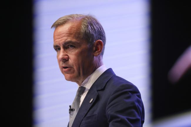 © Bloomberg. Mark Carney describing a 