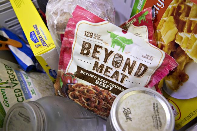 © Bloomberg. A package of Beyond Meat Inc. beef crumbles is displayed for a photograph in Tiskilwa, Illinois, U.S., on Tuesday, April 23, 2019. Beyond Meat Inc., the maker of vegan chicken and beef substitutes backed by some of the biggest names in food and technology, is seeking to raise as much as $184 million in its initial public offering. 