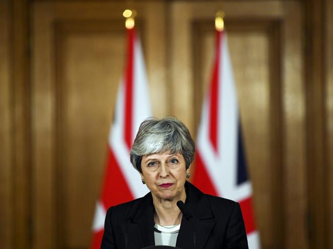 © Bloomberg. Theresa May, U.K. prime minister, makes a statement inside number 10 Downing Street in London, U.K., on Wednesday, March 20, 2019. May gambled her political future on a desperate bid to get her Brexit deal approved by Parliament, as the European Union drove Britain to the brink of an economically disastrous no-deal divorce. 