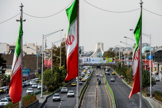 © Bloomberg. National flags of Iran fly above Azadi avenue in Tehran, Iran.in Tehran, Iran, on Saturday, Nov. 3, 2018. Iran’s Supreme Leader Ayatollah Khamenei said U.S. President Donald Trump’s policies are opposed by most governments and fresh sanctions on the Islamic Republic only serve to make it more productive and self-sufficient, the semi-official Iranian Students’ News Agency reported. 