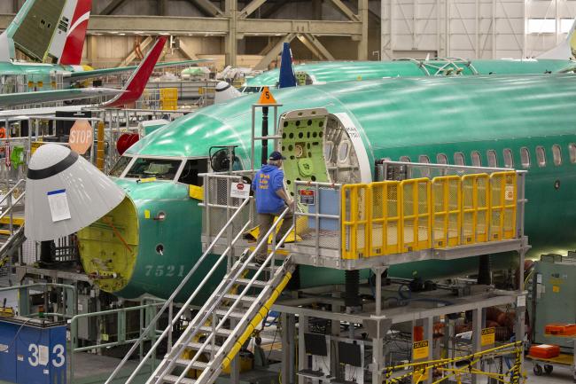 © Bloomberg. A Boeing Co. 737 Max airplane sits on the production line at the company's manufacturing facility in Renton, Washington. 