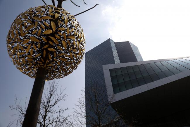 © Bloomberg. A bronze and granite sculpture entitled 'Gravity and Growth' stands outside the main entrance of the European Central Bank (ECB) headquarters in Frankfurt, Germany, on Wednesday, April 10, 2019. The ECB's policy update is only one of several important gatherings this week in the realm of global economics. 
