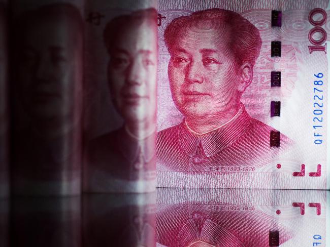 © Bloomberg. Chinese one-hundred yuan banknotes Photographer: SeongJoon Cho/Bloomberg