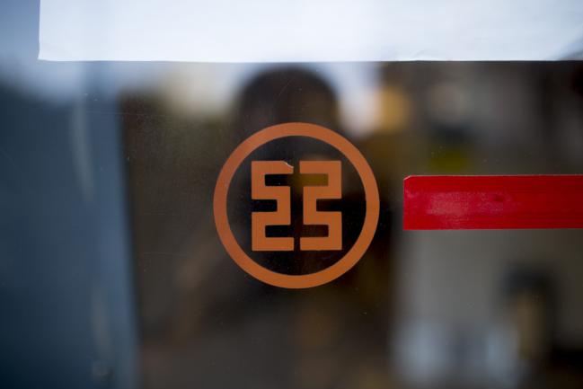 © Bloomberg. The logo for the Industrial & Commercial Bank of China Ltd. (ICBC) is displayed on a branch window in the Tianhe district of Guangzhou, Guangdong province, China. Photographer:Brent Lewin/Bloomberg