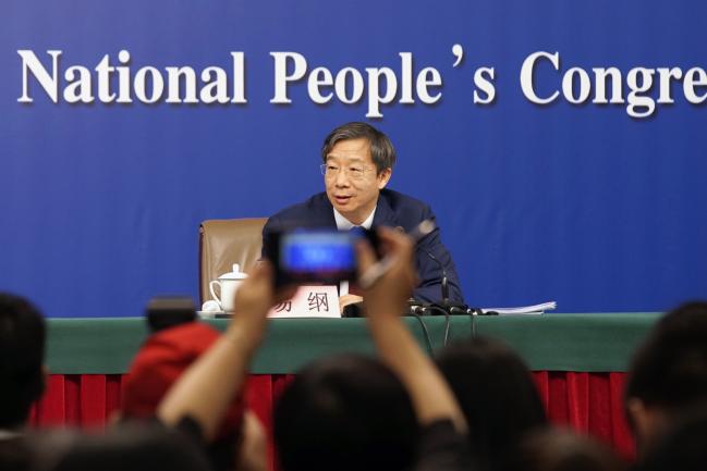 © Bloomberg. Yi Gang, deputy governor of the People's Bank of China (PBOC), speaks at a news conference during the 13th National People's Congress (NPC) in Beijing, China.