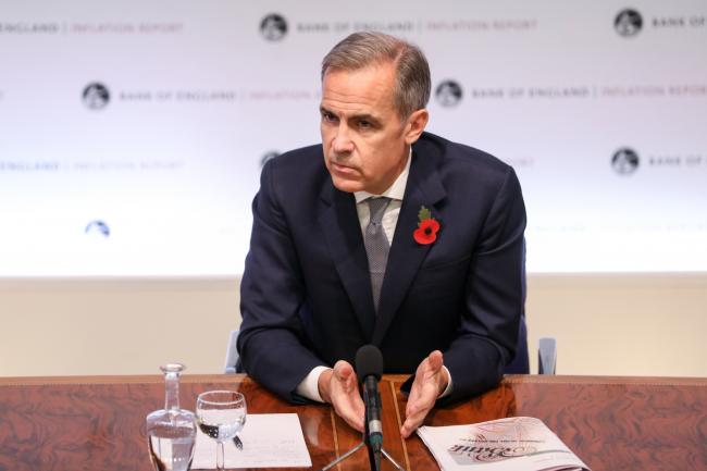 © Bloomberg. Mark Carney, governor of the Bank of England (BOE), gestures while speaking during the bank's quarterly inflation report news conference in the City of London in London, U.K., on Thursday, Nov. 1, 2018. The BOE hinted there may be a need for faster rate increases in the coming years in a report dominated by uncertainty over Brexit. Photographer: Chris Ratcliffe/Bloomberg