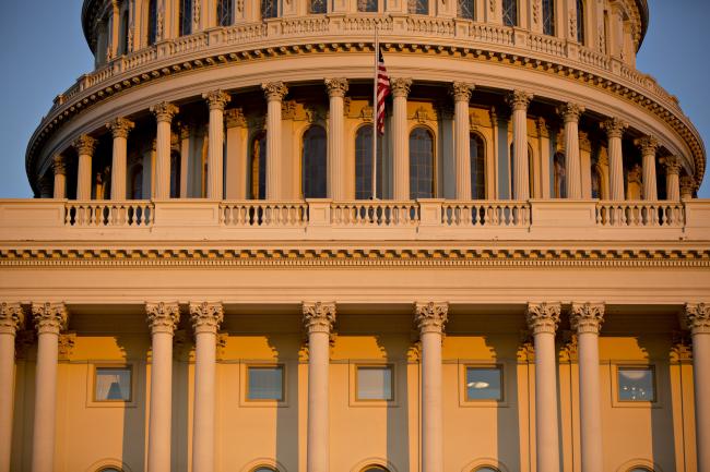 © Bloomberg. The U.S. Capitol stands at sunset in Washington, D.C., U.S., on Thursday, Feb. 8, 2018. A Senate vote on a bipartisan budget deal that would avert a government shutdown is being held up by a Kentucky Republican who objects to higher spending, raising the risk of a temporary lapse of federal funding if Congress cant act by a midnight deadline.