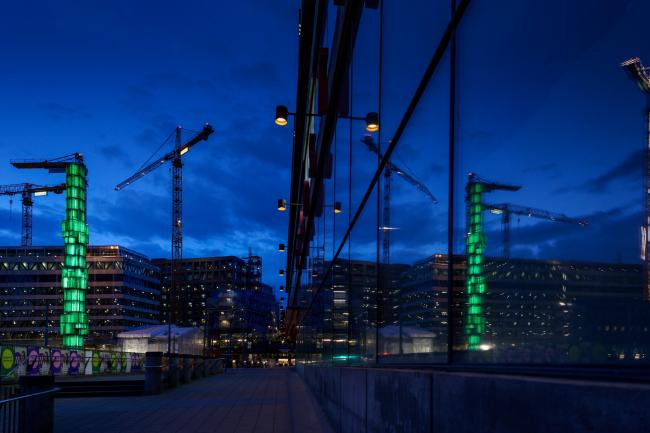 © Bloomberg. Sculpture Crystal, vertical accent in glass and steel, stands illuminated green in Sergel Square in Stockholm, Sweden, on Monday, May 6, 2019. Electricity capacity issues could hit an economy already heading south after years of strong growth buoyed by household spending and exports. Photographer: Mikael Sjoberg/Bloomberg