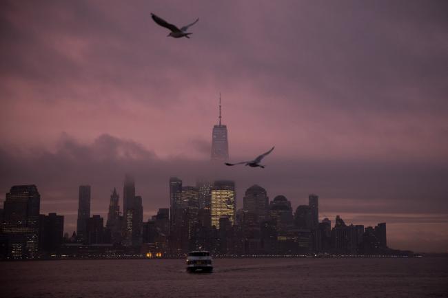 © Bloomberg. A ferry moves along the Hudson River in Hoboken, New Jersey. Photographer: Michael Nagle/Bloomberg