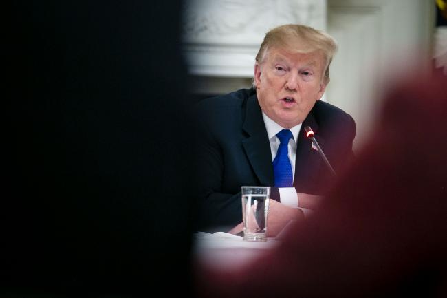 © Bloomberg. U.S. President Donald Trump speaks during an American Workforce Policy Advisory board meeting in the State Dining Room of the White House in Washington, D.C., U.S., on Wednesday, March 6, 2019. Photographer: Al Drago/Bloomberg