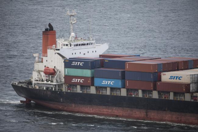 © Bloomberg. SITC International Holdings Co. branded shipping containers sit onboard a container ship in Hong Kong, China, on Friday, July 7, 2017. Hong Kong May exports rose 4 percent from a year earlier to HK$303.1 billion. Imports rose 6.6 percent from a year earlier to HK$338.8 billion, the Hong Kong Government Information Center said in a statement.